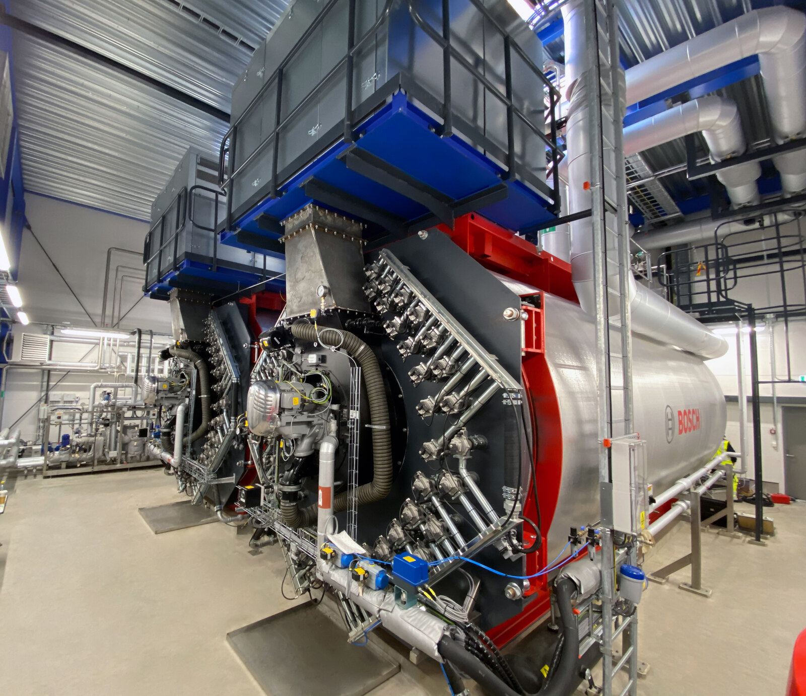 Bosch bio-oil boiler with innovative compressed air cleaning system at Eidsiva Bioenergi AS in Denmark